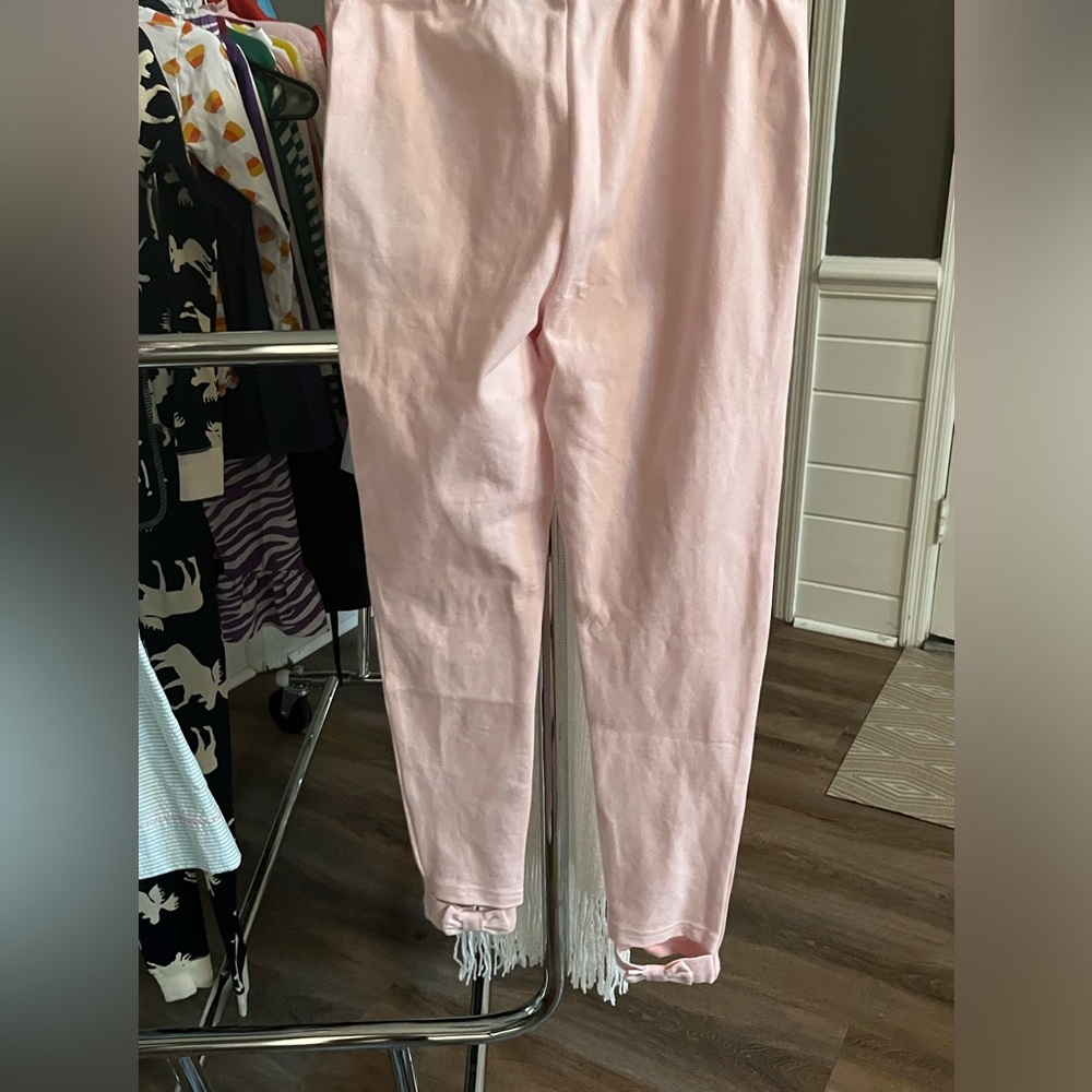 Polo Ralph Lauren’s girls baby pink leggings with bows on the bottom back of leg